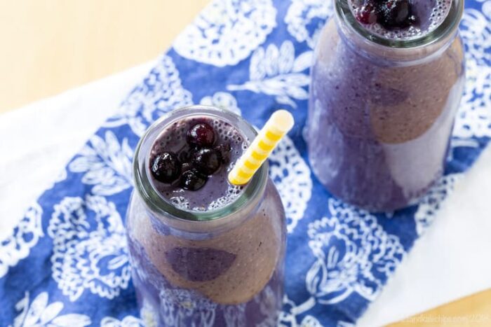 Blueberry Almond Butter Smoothie with wild blueberries on top