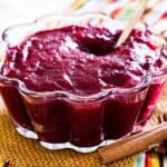 A glass bowl of Cinnamon Orange Cranberry Sauce