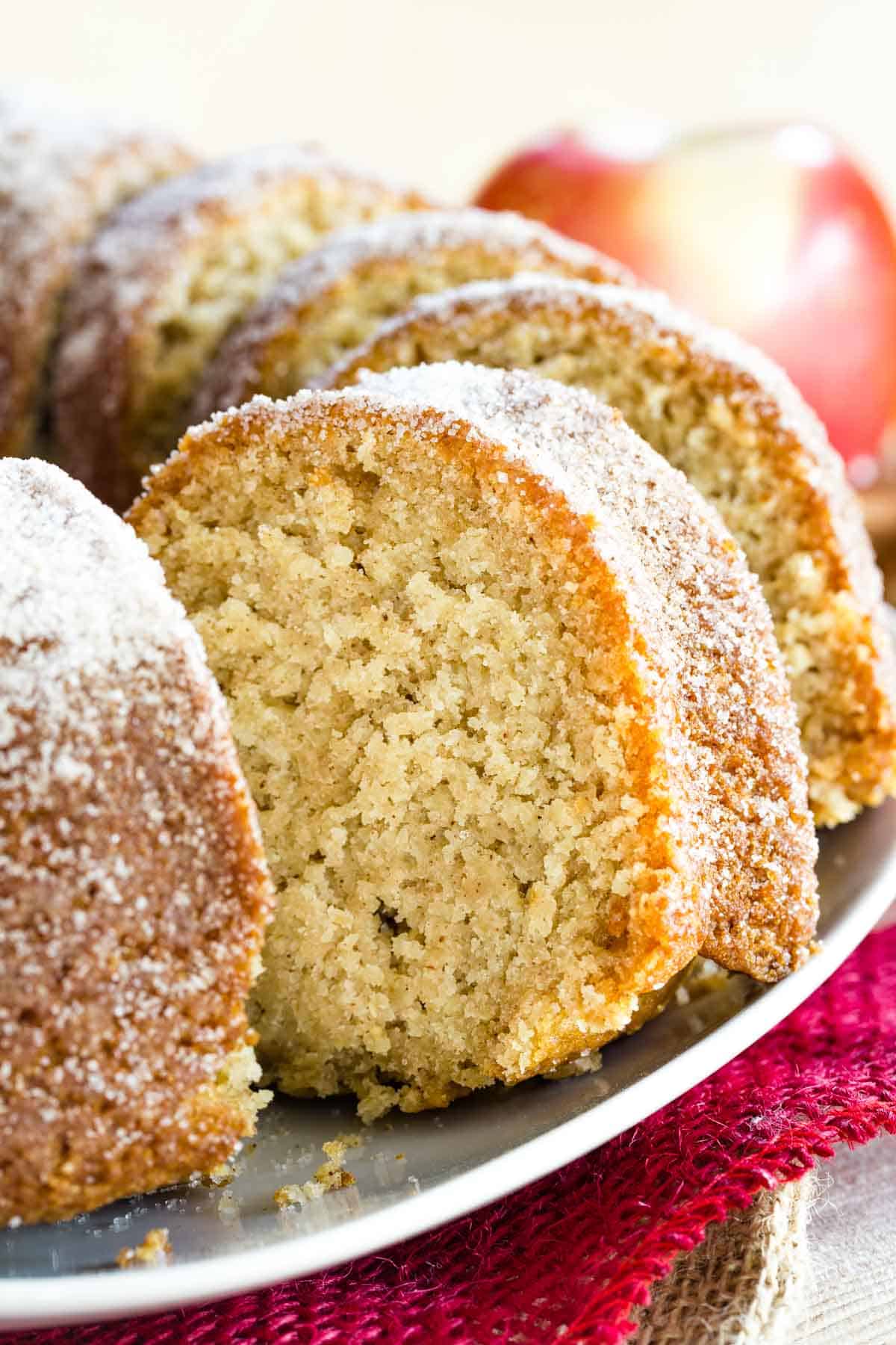 Close up of a slice of gluten free apple bundt cake