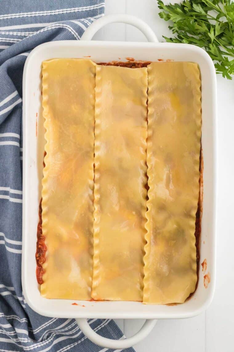 Lasagna noodles layered in a pan