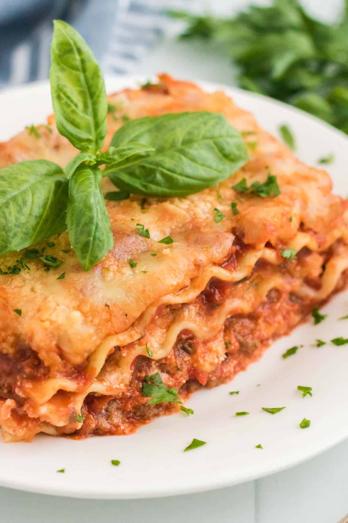 A slice of homemade lasagna on a plate