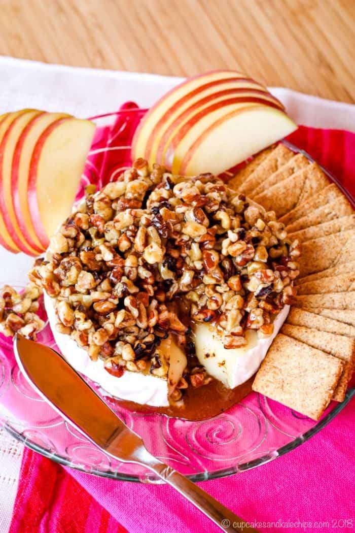 Baked Brie appetizer topped with honey glazed nuts