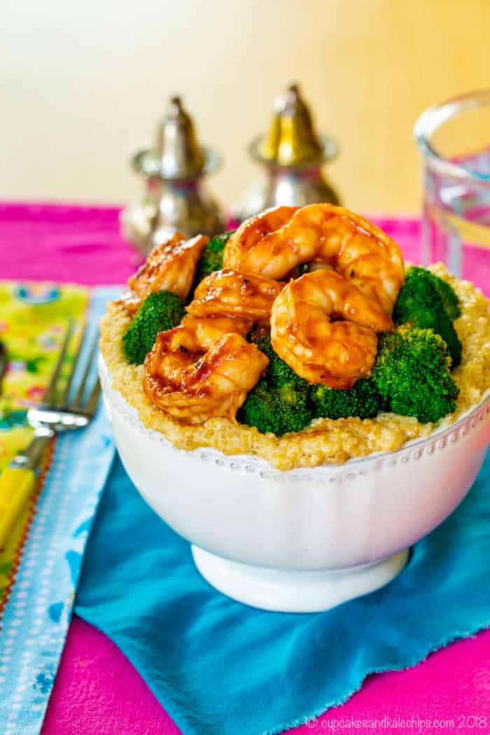 bowl of broccoli and BBQ shrimp over quinoa