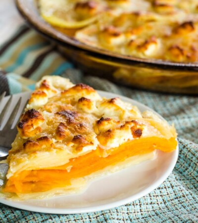 Slice of Goat Cheese Sweet Potato Gratin with a fork