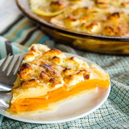 Slice of Goat Cheese Sweet Potato Gratin with a fork