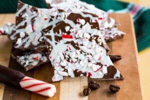 Easy Christmas candy Peppermint Mocha Chocolate Bark with a candy cane and coffee beans