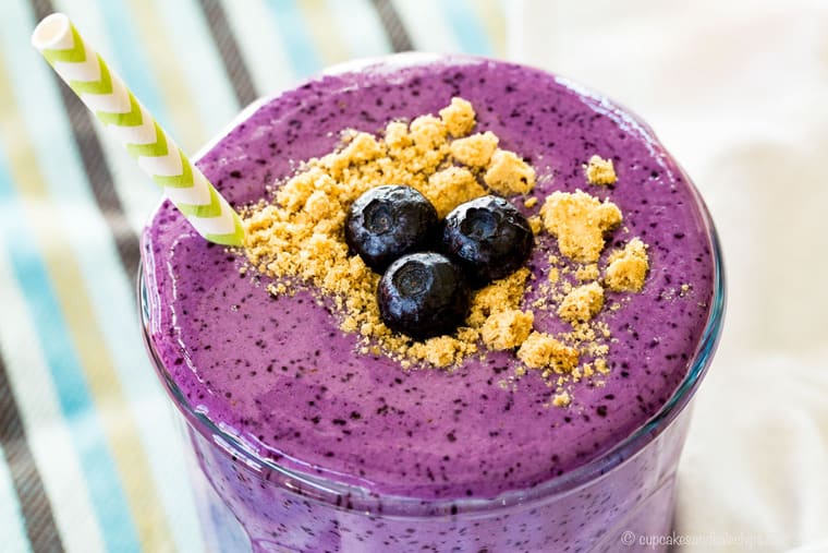 Closeup of top of a Blueberry Cheesecake Smoothie with graham cracker crumbs