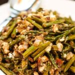Closeup of Roasted Asparagus Salad with Caramelized Leek, Feta, and Dried Cherries
