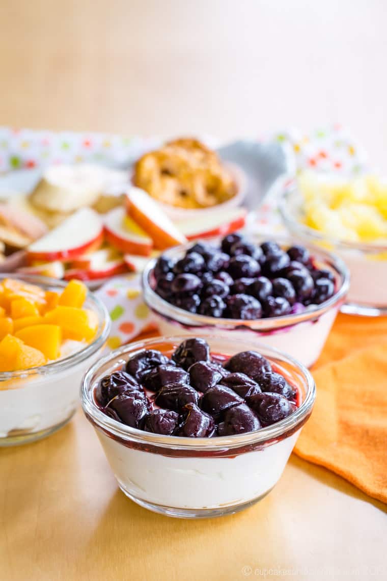 Individual Greek Yogurt Fruit Dip Snack Hack with fruit and pretzels for dipping