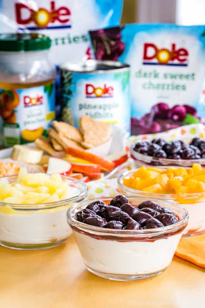 Individual Greek Yogurt Cheesecake Fruit Dip with a selection of Dole Packaged Food frozen and canned fruit