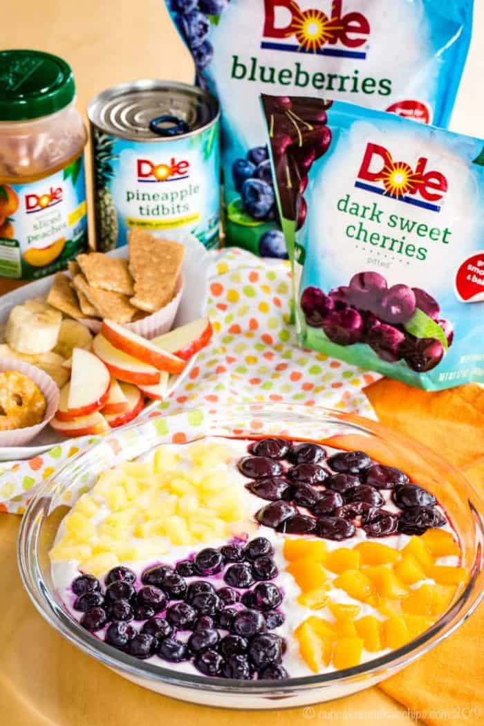 Greek Yogurt Cheesecake Fruit Dip with a selection of Dole Packaged Food frozen and canned fruit