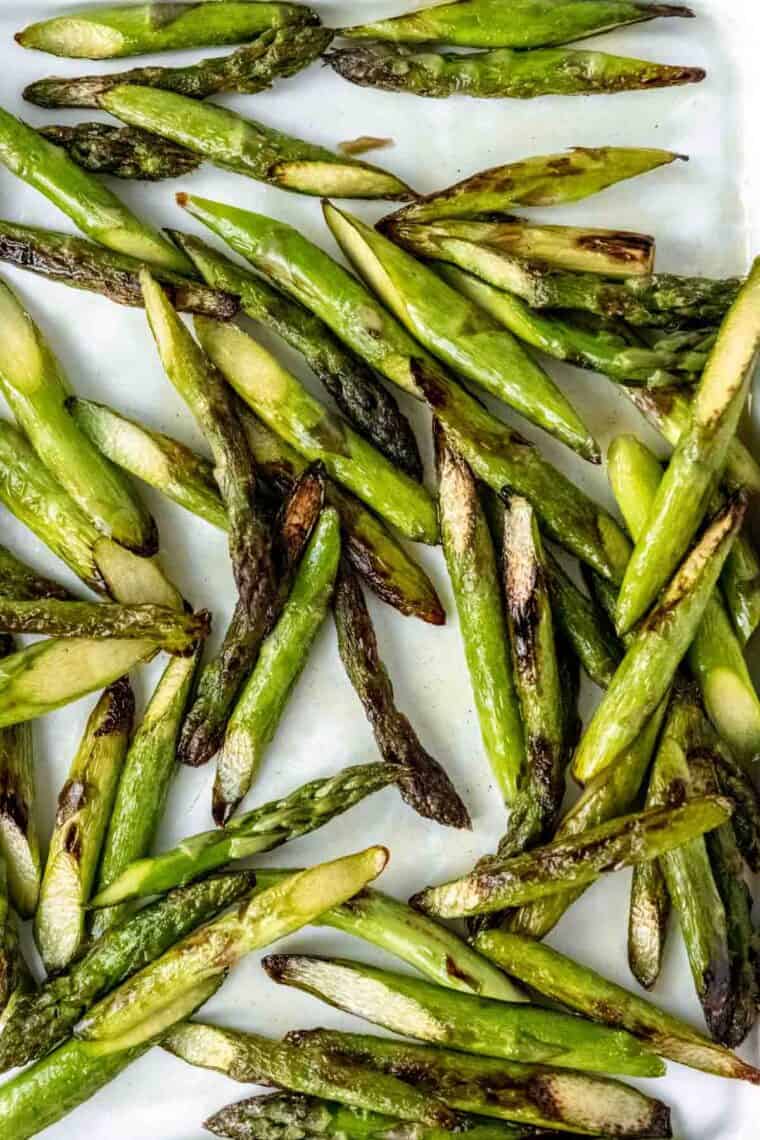Close up overhead view of roasted asparagus.