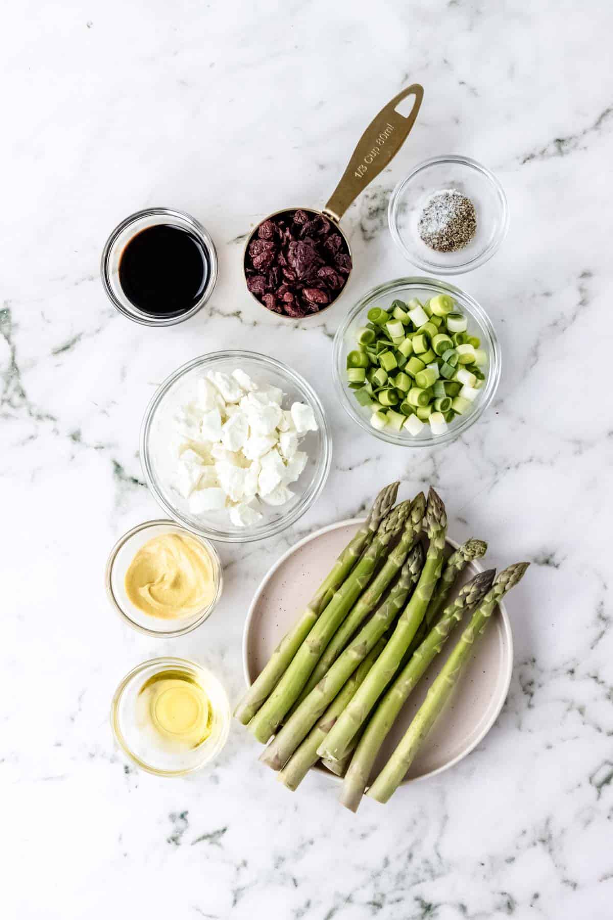 The ingredients for roasted asparagus salad with caramelized leeks.