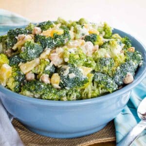 Tropical Broccoli Pineapple Salad Recipe in a blue bowl.