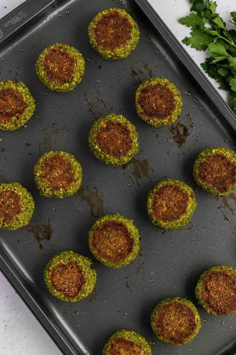 Baked falafel on a baking sheet