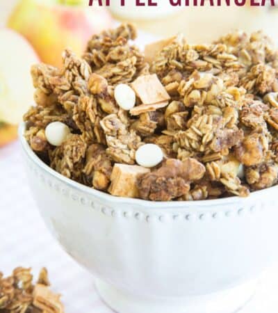 A white bowl of granola with text overlay that says "Cinnamon Apple Granola".