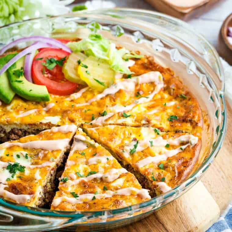 Bacon cheeseburger crustless quiche in a glass pie plate