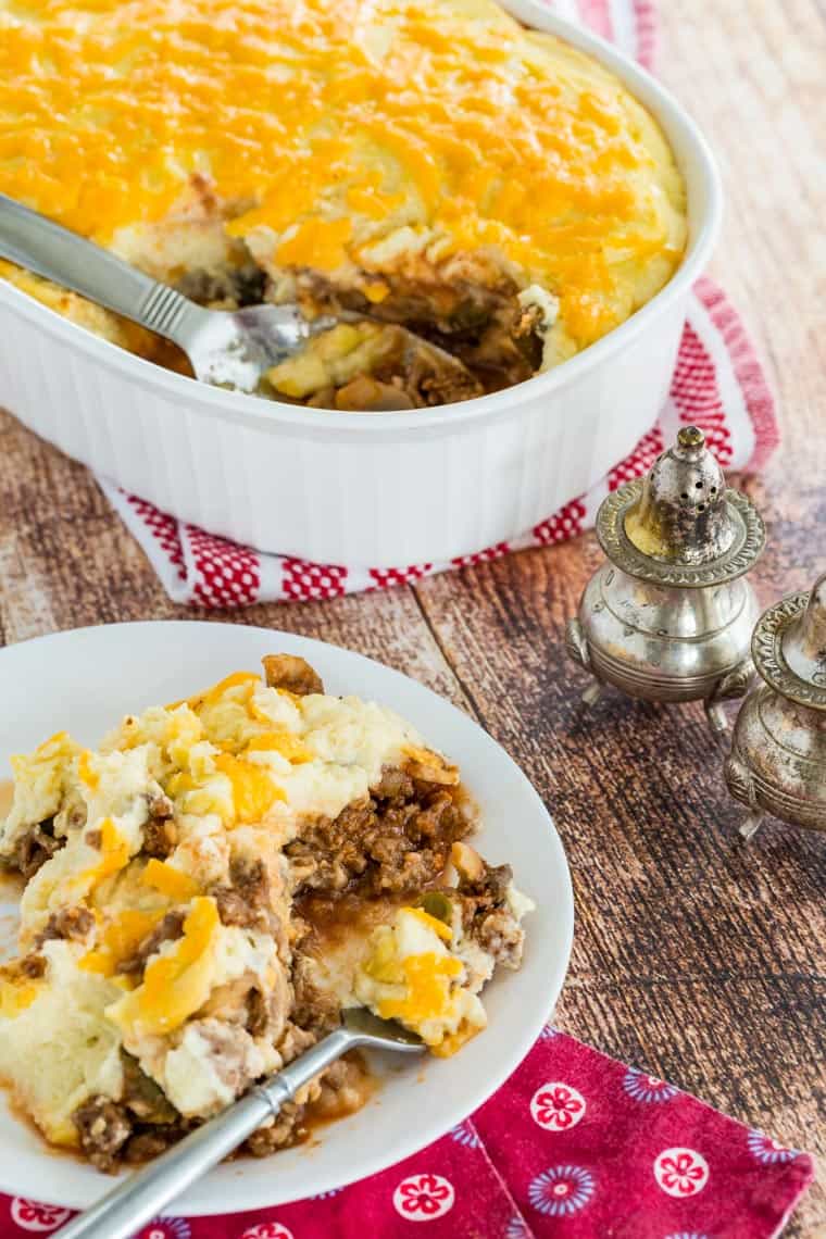 Healthy Shepherd's Pie scooped from a casserole dish onto a plate