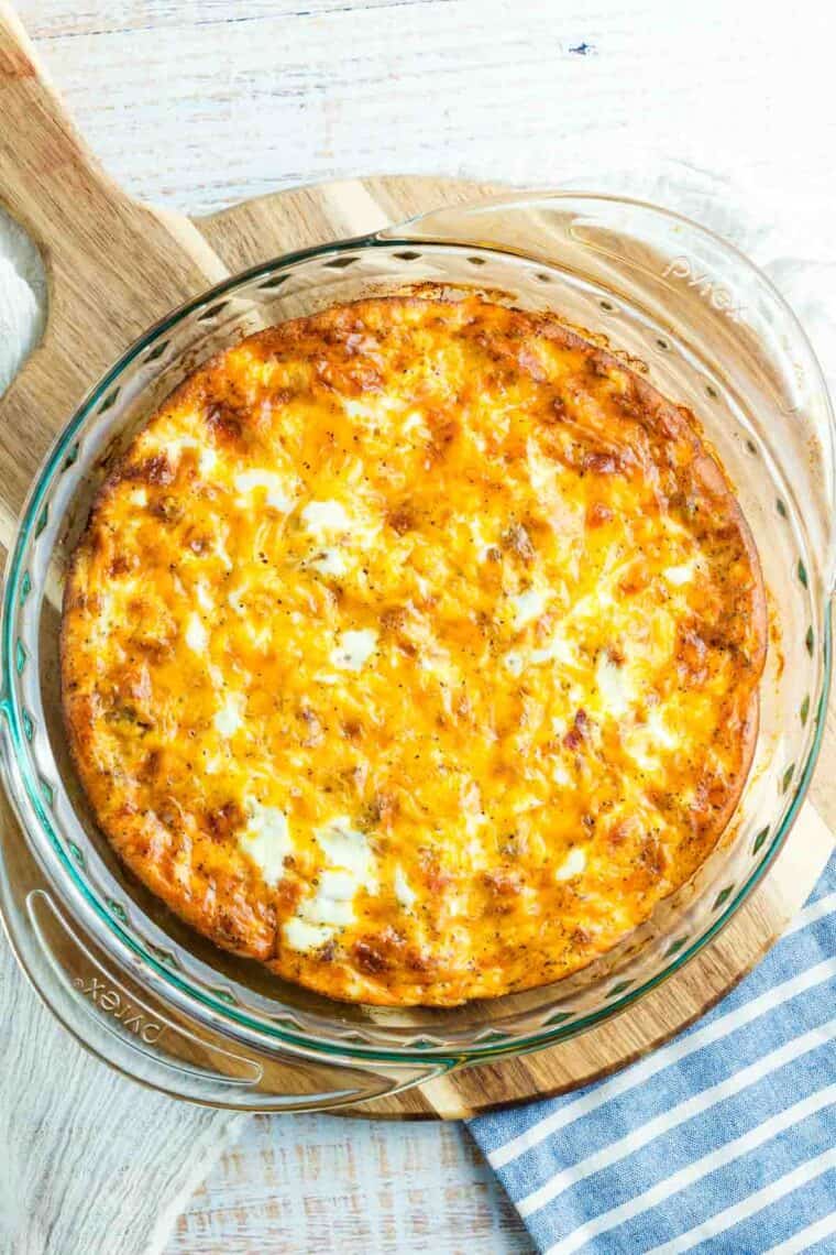 Bacon Cheeseburger Crustless Quiche is made with ground beef, bacon, and cheese, plus your favorite burger toppings. Overhead view of a crustless quiche