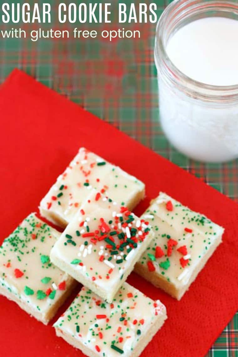 Sugar Cookie Bars on a red napkin with milk