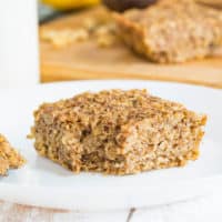 Banana Nut Breakfast Bar on a white plate with a fork