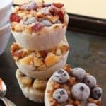stacked frozen oatmeal cups topped with fruit