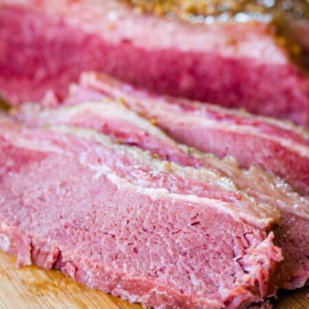 Tender, cooked corned beef brisket that has been sliced into thin pieces.