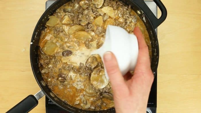 Thicken ground beef and potatoes skillet meal with cornstarch and water slurry