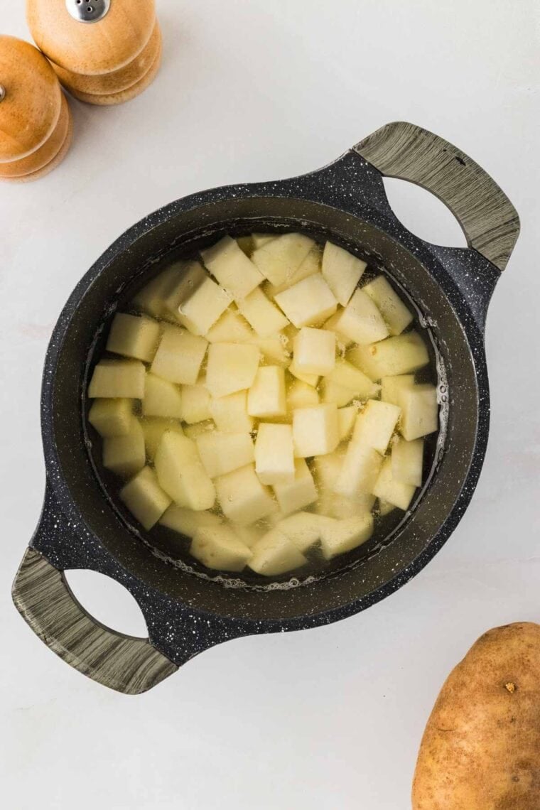 Potatoes in water in a pot