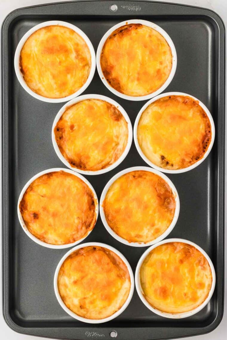 Overhead view of mini shepherd's pies on a baking sheet