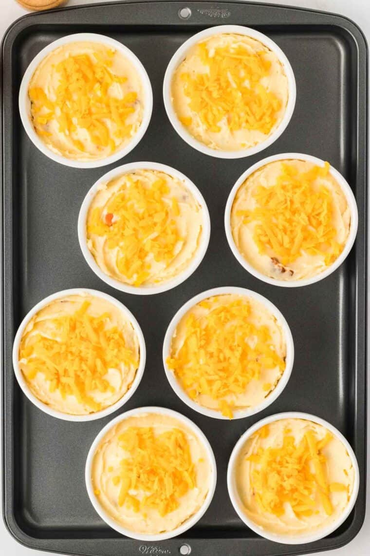Overhead view of assembled individual shepherd's pies before baking