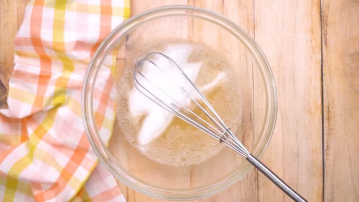 Whisking sugar into gelatin solution
