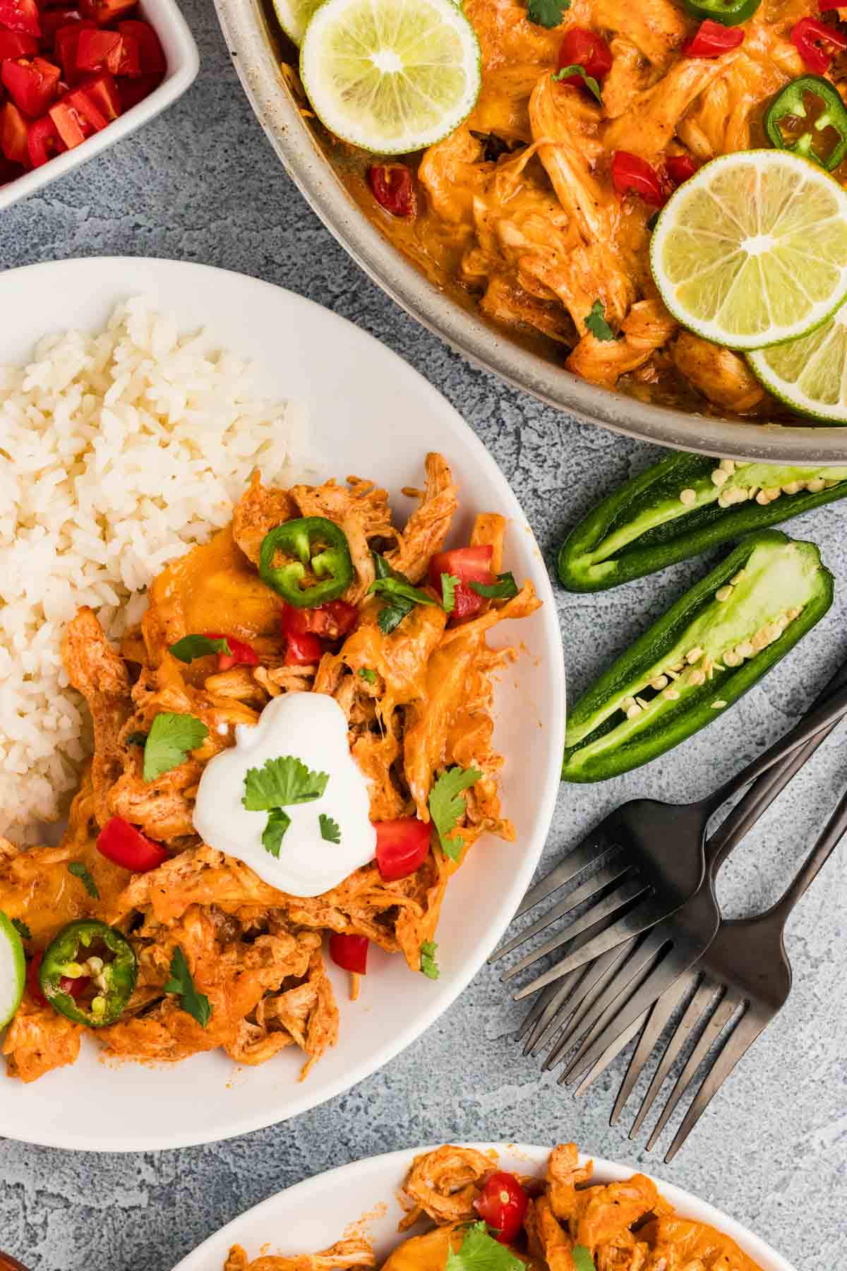 A serving of chicken enchilada skillet dinner on a plate with rice