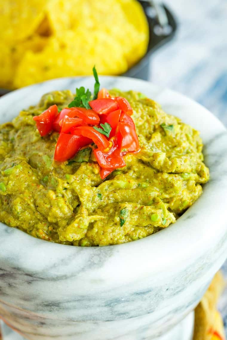 Closeup of this Kid-Friendly Guacamole Recipe in a marble mortar