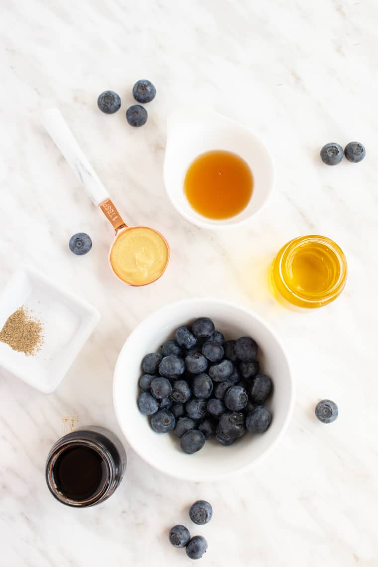 Overhead of ingredients to make Blueberry Balsamic Salad Dressing