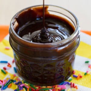 A small jar of homemade hot fudge sauce