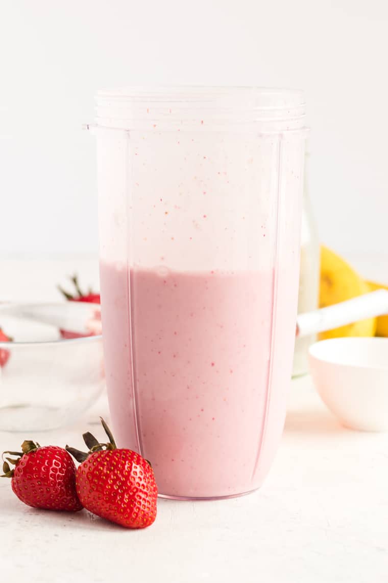Strawberry Cheesecake Smoothie in a blender cup