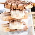 A stack of Swirled Nutella Banana Popsicles with title