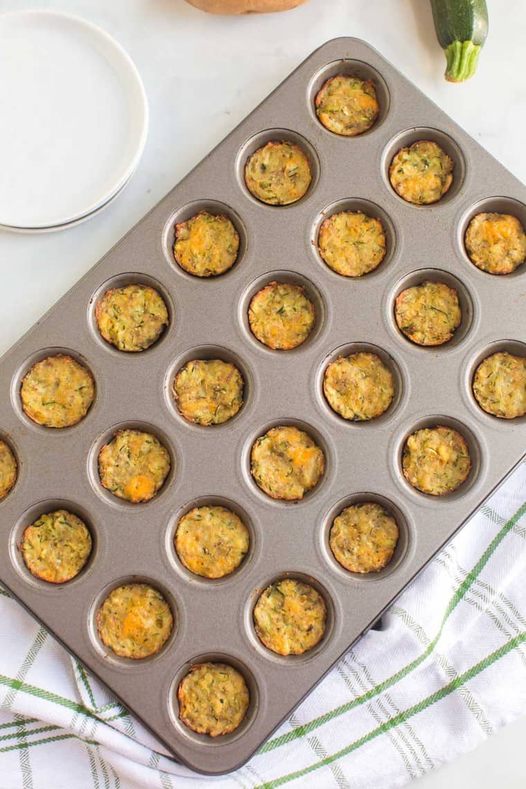 Overhead of Baked Potato Zucchini Tots in a mini muffin tin