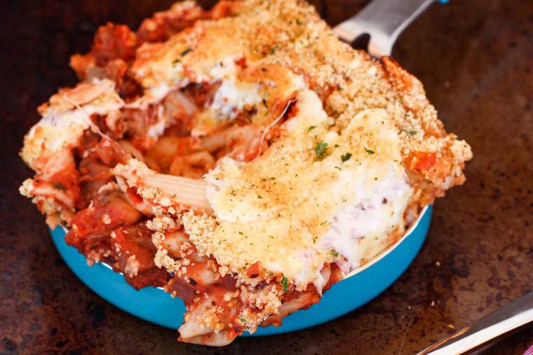 Eggplant Parmesan Casserole scooped into a small pan