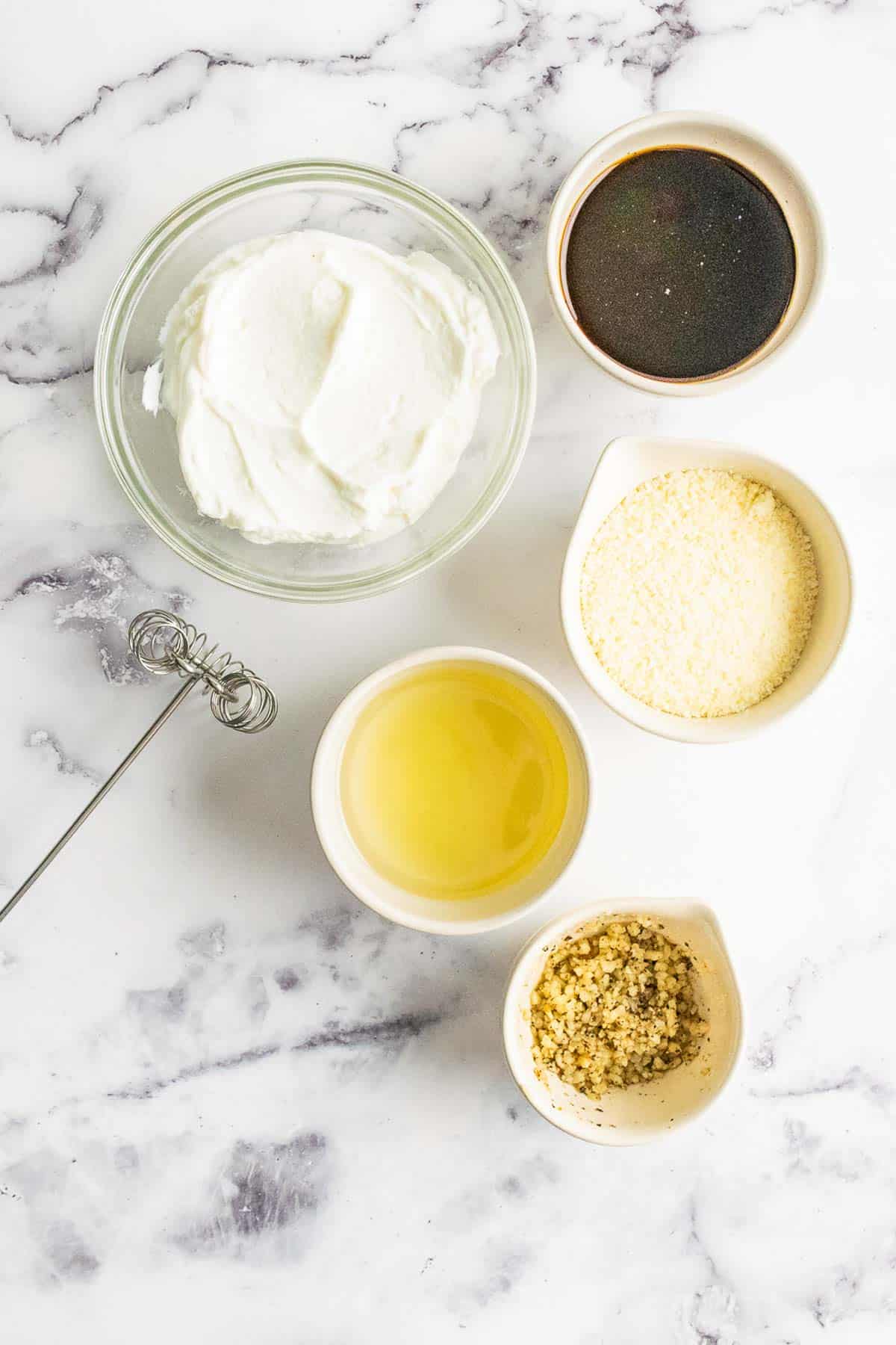 Healthy Caesar Dressing Ingredients in bowls.