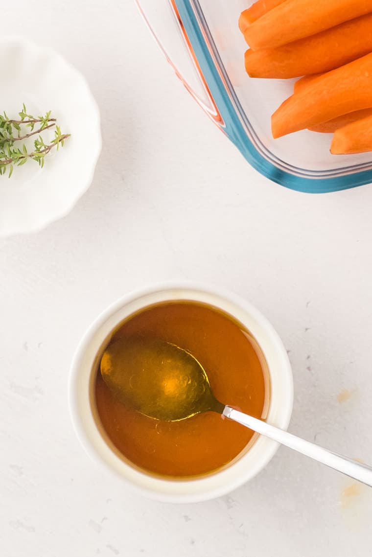 Honey Balsamic Glaze in a bowl with a spoon