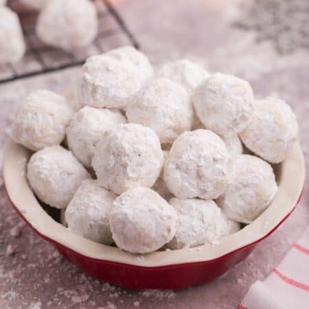 Serving bowl of gluten free snowball cookies