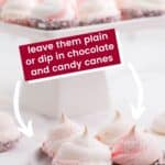Peppermint Meringues dipped in chocolate and candy canes on a small white plate