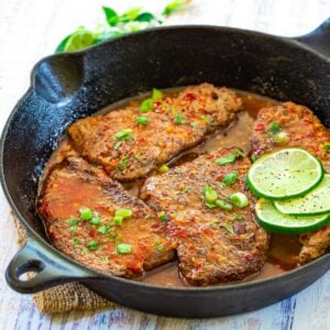 Chili lime cube steaks in a cast iron skillet