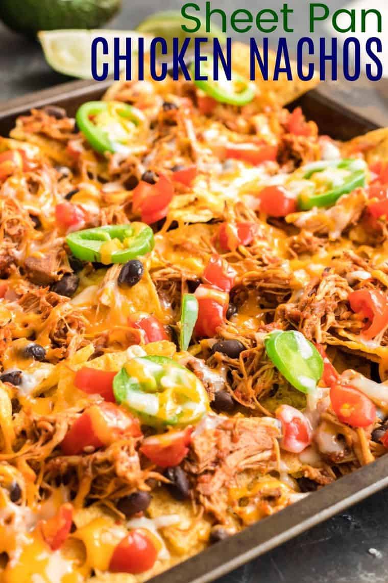 Sheet Pan Chicken Nachos covered with melted cheese