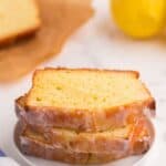 Three stacked slices of a lemon loaf on a white plate with text overlay that says "Gluten Free Lemon Pound Cake".