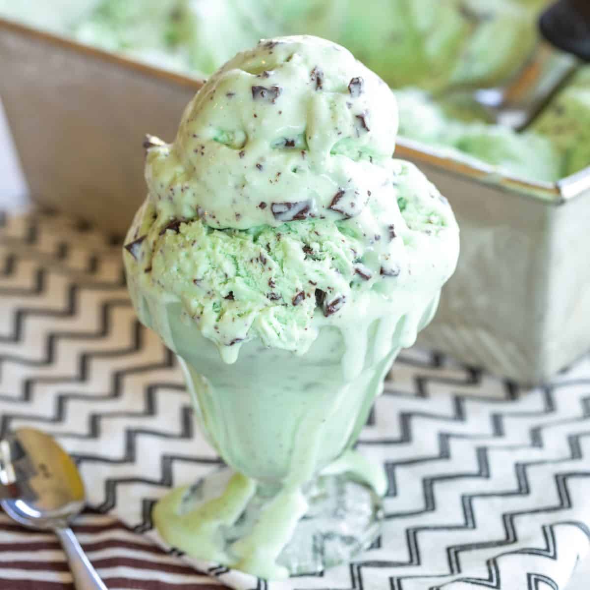 A glass dish of no-churn mint chocolate chip ice cream