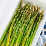 Air fryer asparagus on a white plate