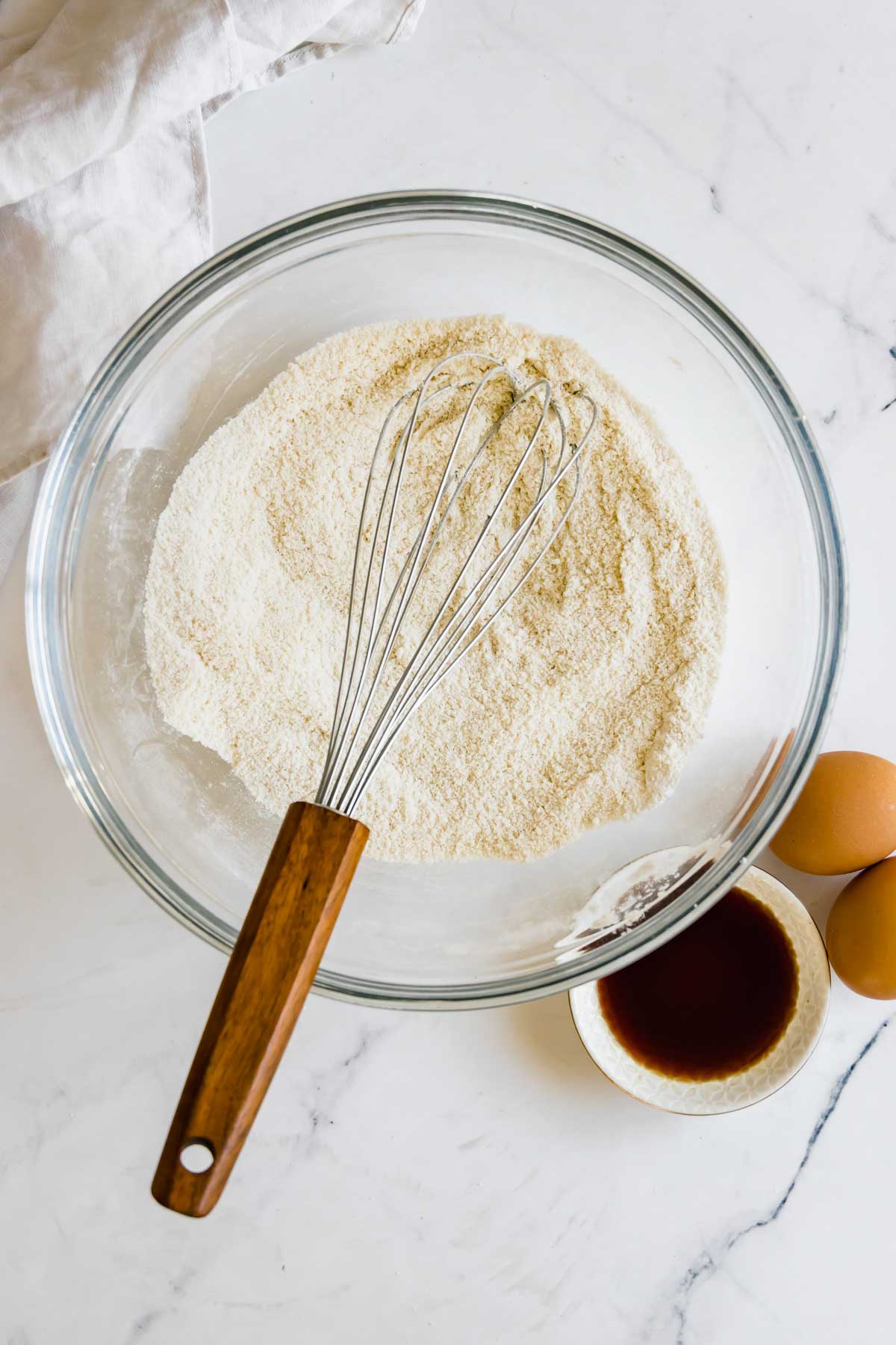 Almond Flour Whisked Together with Gluten-Free Flour in a Mixing Bowl